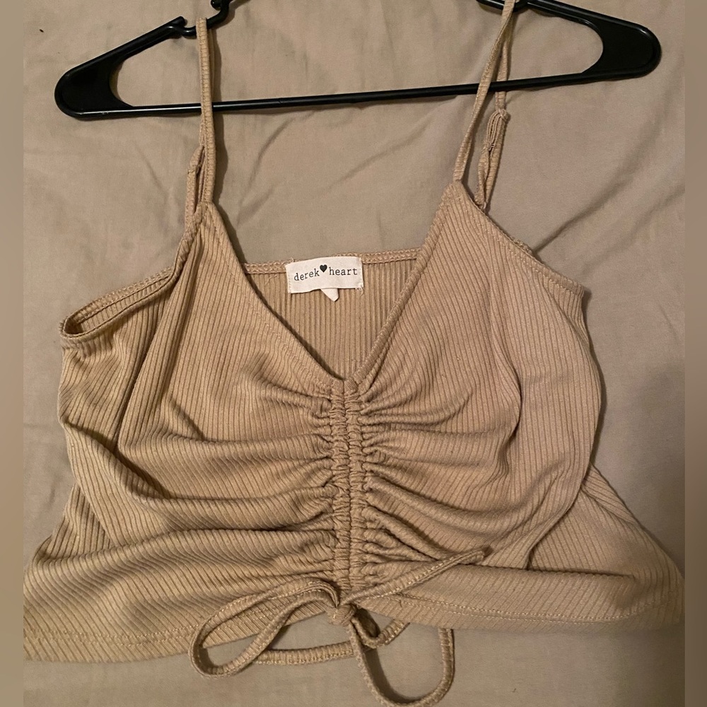 cute cropped tan tank top that has an adjustable scrunch in the middle